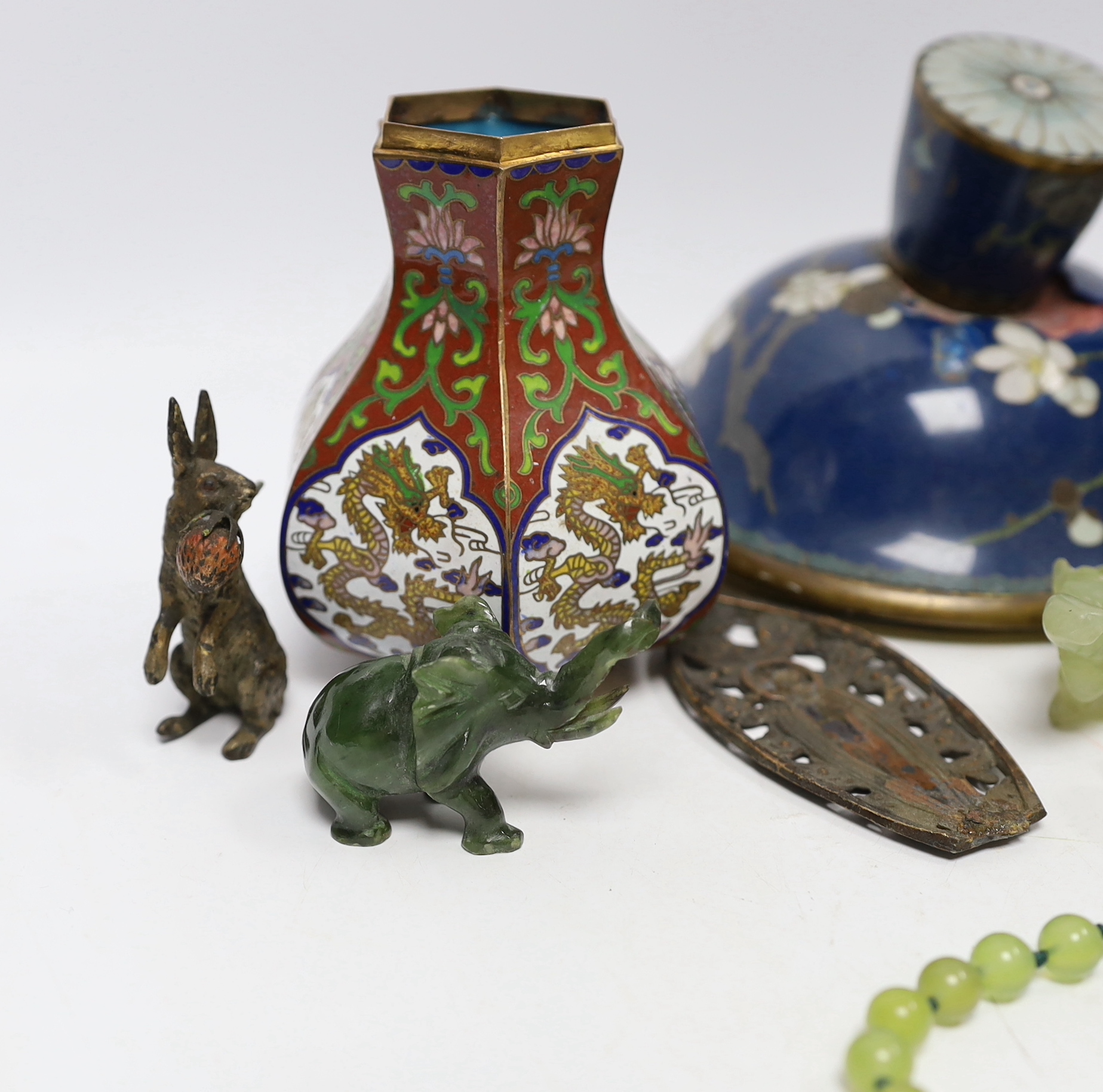 A collection of Chinese and other Oriental items including a cloisonné enamel vase, carved elephants and Buddhas head, largest 9cm high